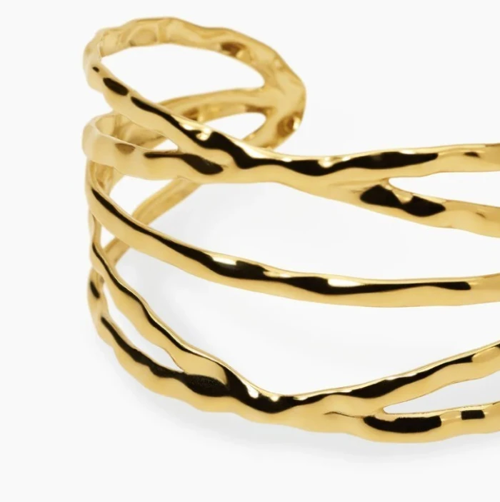 Brazalete rígido de acero dorado