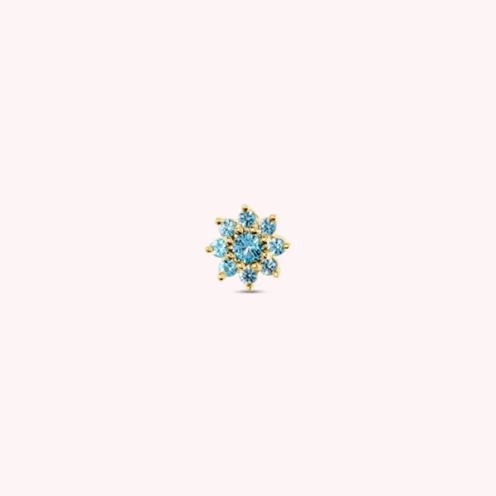 PIERCING FLOR TURQUESA TRANSPARENTE