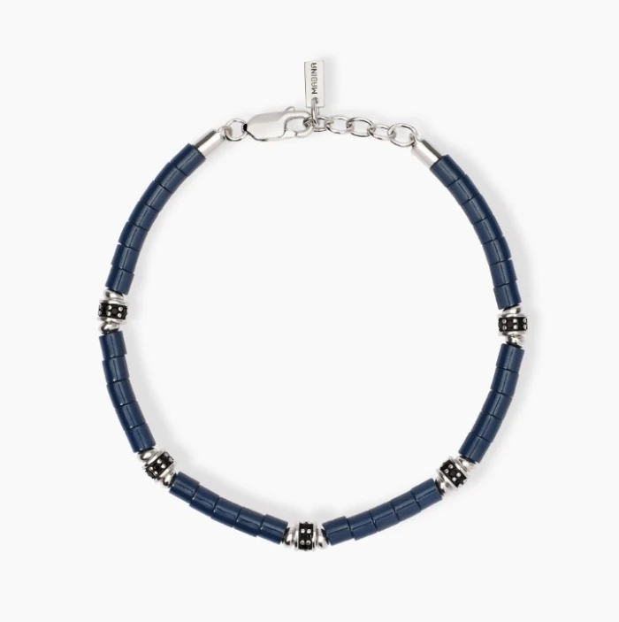 Pulsera de hombre con elementos de cerámica azul.Parada en boxes