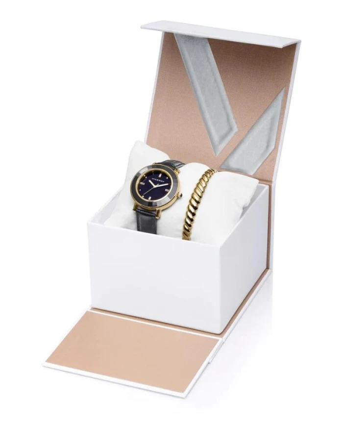 Chic caja de acero en Ip dorado con correa de piel negra, y pulsera esclava de acero en Ip dorado