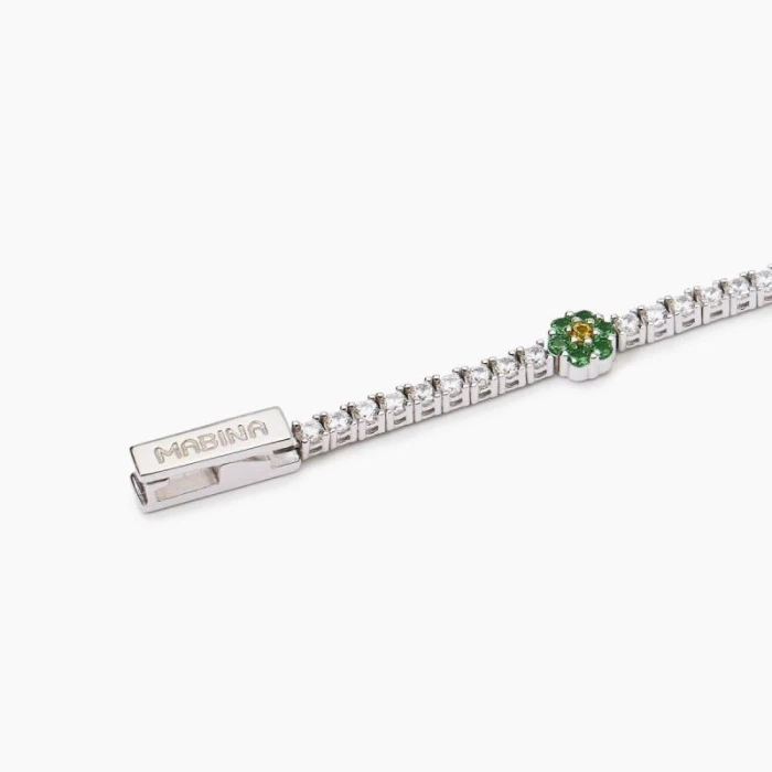 Pulsera de tenis con elementos florales.FLOR FLOR