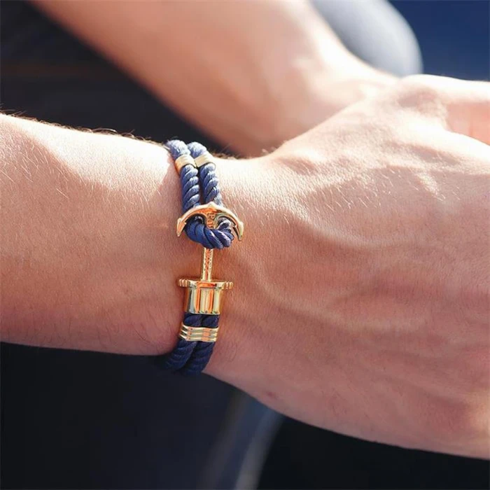 PULSERA NYLON AZUL ANCLA DORADO